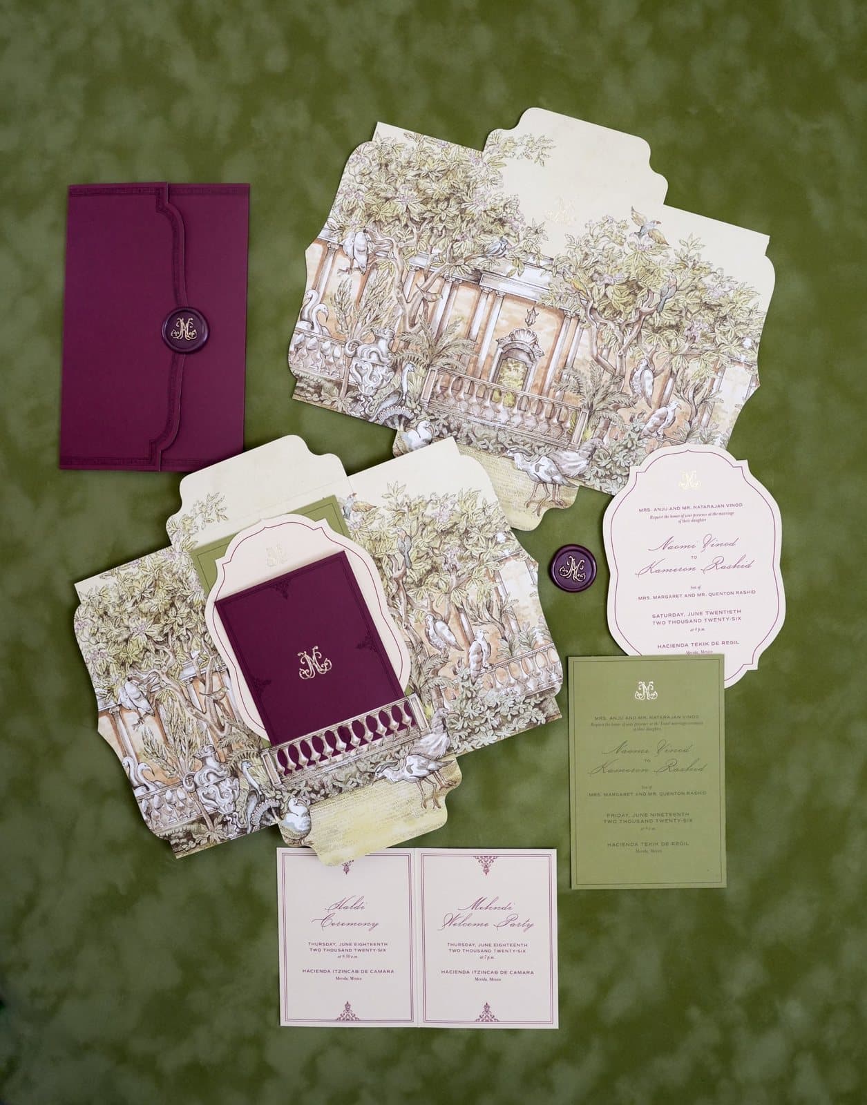 IuMi Studio invitation suite: plum envelope with monogrammed wax seal, die-cut envelopes with an illustrated garden and balustrade, shaped invitation and Haldi and Mehndi event cards