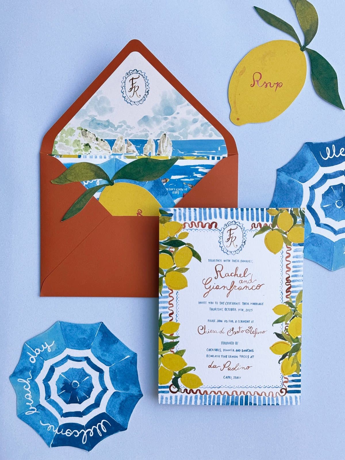 Hand-lettered invitation framed by lemons and blue majolica stripes, with envelope, lemon RSVP and beach umbrella cards